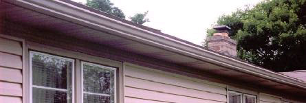 Seamless gutters and spouting installed along a home's roofline